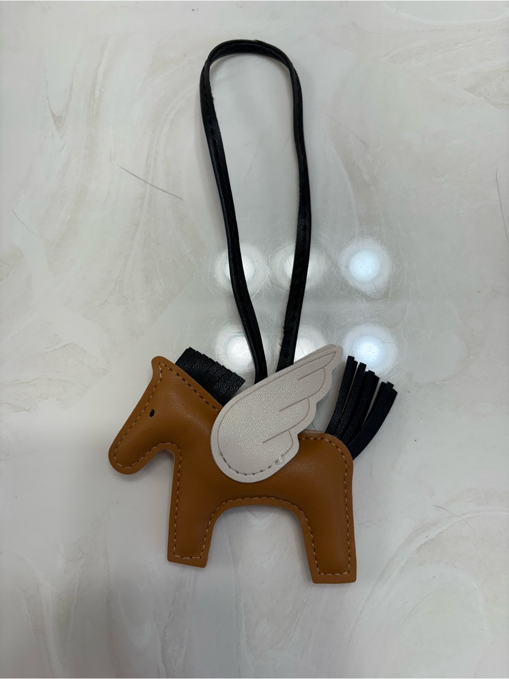 New without tag: Brown pegasus with white wing Bag Charm